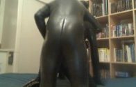 Sissy crossdresser in full latex catsuit and boots fucked hard in