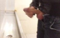 Pissing and jerking in public urinal